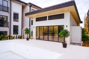 Just 5 minutes from airport with pool and guarded.